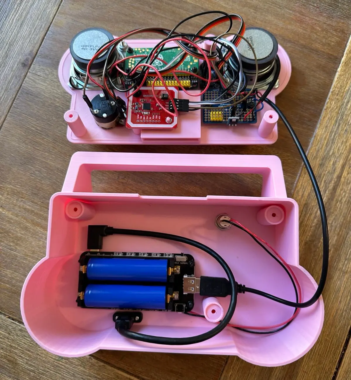 inner workings and wires of the raspberry pi boombox